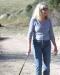 Volcan Volunteer Sheana Fry walking her dog; photo by Taylor Cole