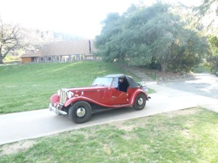 Rich Caputo's vintage roadster in front of Camp Stevens' Dining Hall