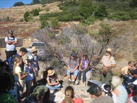 Ranger Bobbi Thompson speaking to hiking group